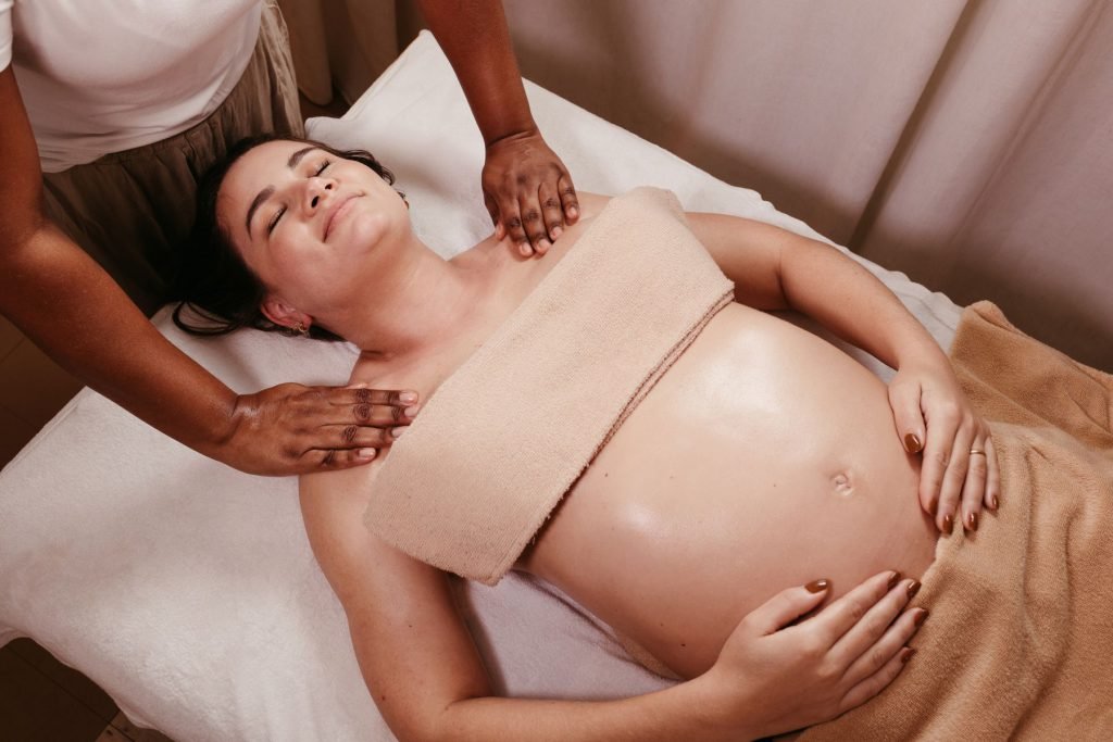 A woman resting during a pregnancy massage