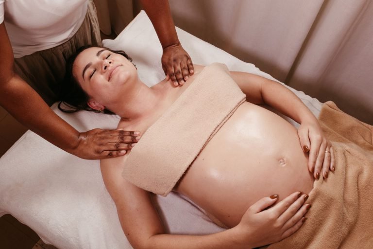 A woman resting during a pregnancy massage